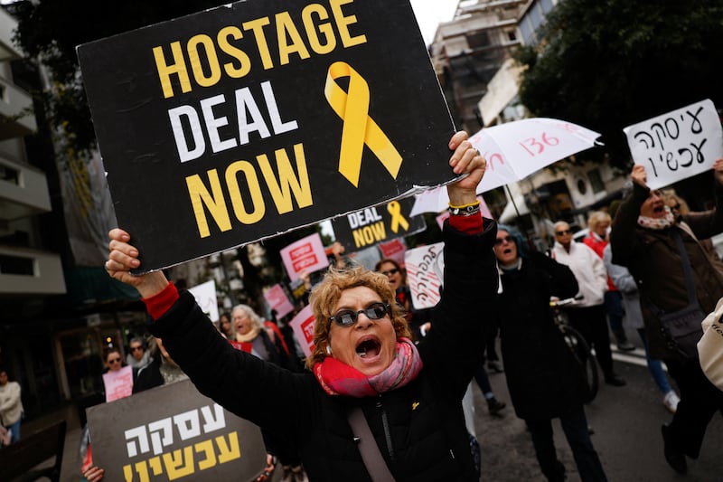 People protest in Tel Aviv on Thursday, demanding a hostage deal to end the violence between Israel and Hamas in Gaza. Reuters