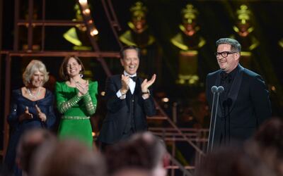 LONDON, ENGLAND - APRIL 07:  (L-R) Camilla, Duchess of Cornwall, Darcey Bussell and Richard E. Grant present the Special Award to Matthew Bourne on stage during The Olivier Awards 2019 with Mastercard at the Royal Albert Hall on April 07, 2019 in London, England. (Photo by Jeff Spicer/Getty Images)