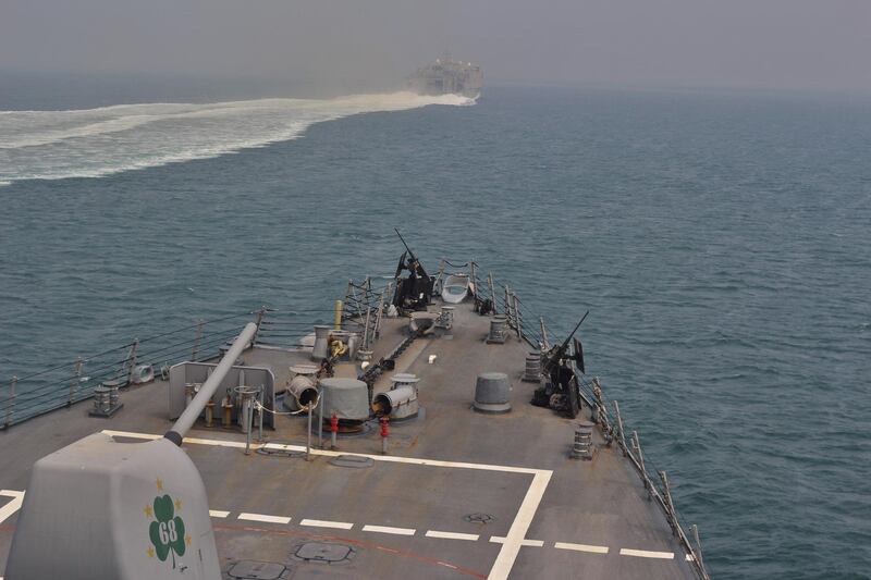 The U.S. Navy guided-missile destroyer USS The Sullivans and the Military Sealift Command joint high-speed vessel USNS Choctaw County transit through the Strait of Hormuz August 8, 2018. Picture taken August 8, 2018.  U.S. Navy/Lt. Daphne White/Handout via REUTERS.  ATTENTION EDITORS - THIS IMAGE WAS PROVIDED BY A THIRD PARTY