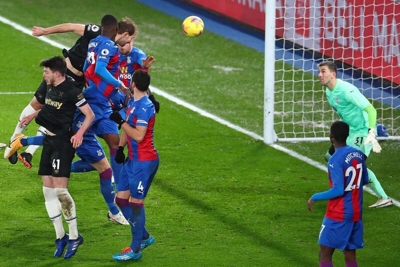 West Ham United's English defender Craig Dawson scores his team's third goal. AFP