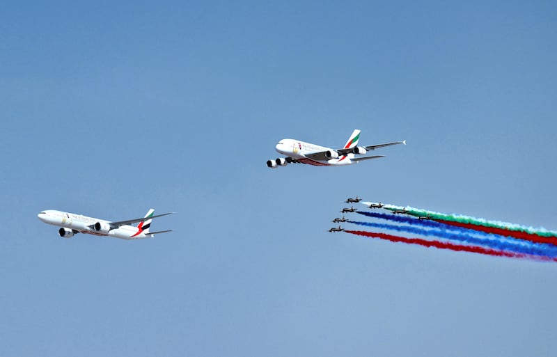 Emirates Boeing 777 and Airbus A380 open the Dubai Airshow flying display with a spectacular fly past with Al Fursan. Courtesy Emirates