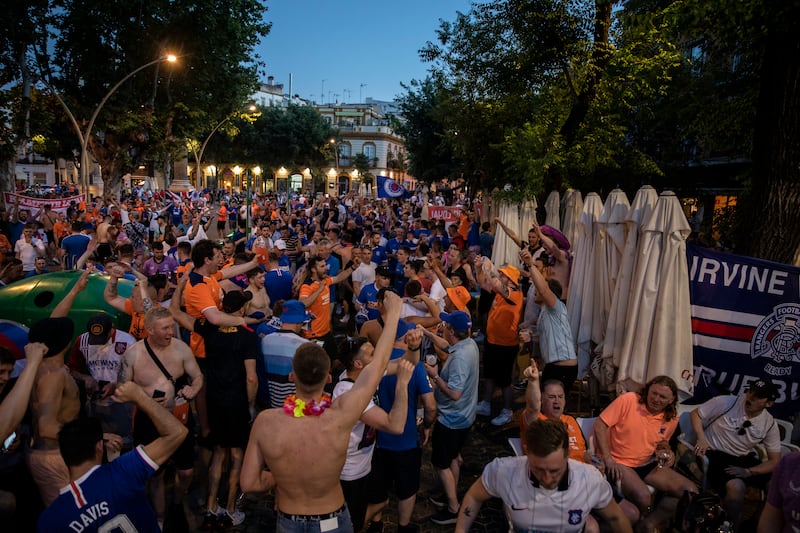 Rangers fans enjoy the atmosphere on the eve of the Europa League final in Seville. Getty
