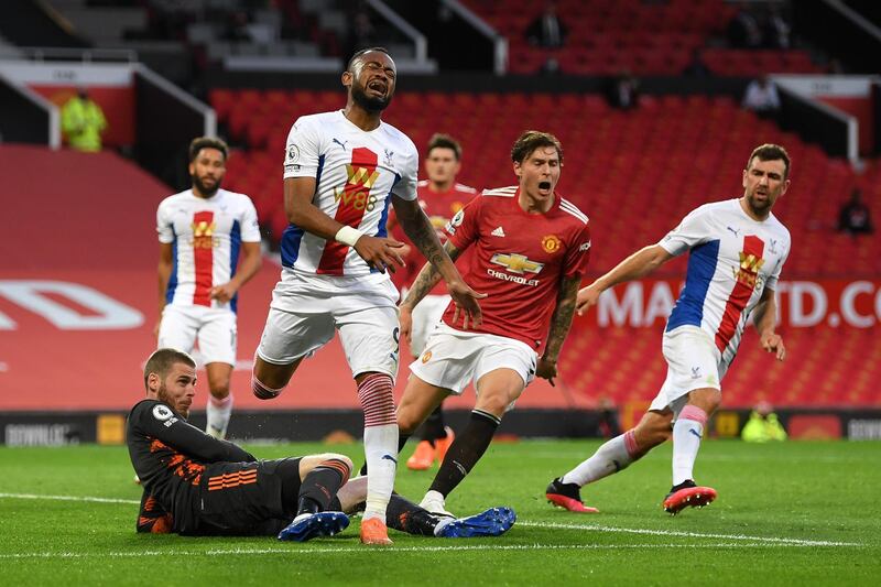 Palace's Jordan Ayew after having a penalty saved, although a VAR review then leads to Crystal Palace retaking the penalty and scoring through Wilfried Zaha. Getty