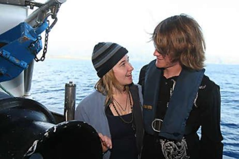 Abby Sunderland, left, meets with her brother Zac, after being rescued from an aborted solo attempt to sail around the world. Sunderland's boat was crippled by storms.