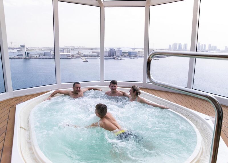 ABU DHABI, UNITED ARAB EMIRATES. 8 DECEMBER 2019. 
A family in a jacuzzi overlooking Abu Dhabi and the Louvre from MSC Bellissima at Abu Dhabi Cruise Terminal.

(Photo: Reem Mohammed/The National)

Reporter:
Section:
