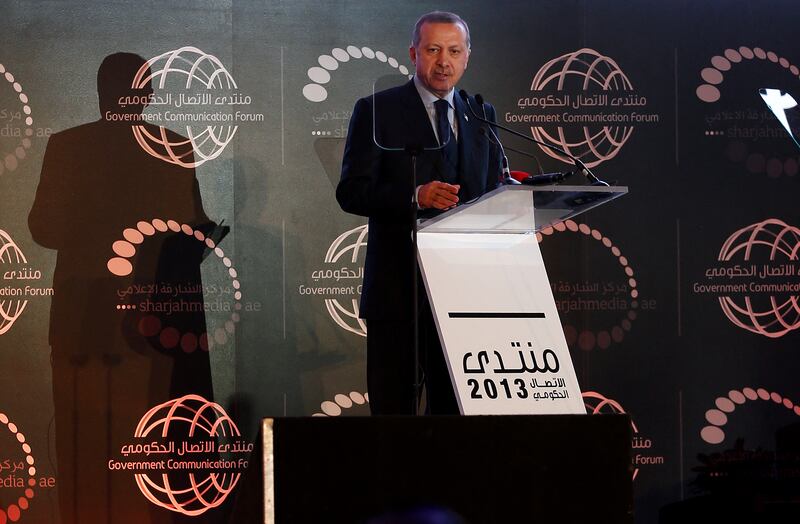 Mr Erdogan gives a speech during the opening session of the Government Communication Forum in February 2013 in Sharjah. AFP