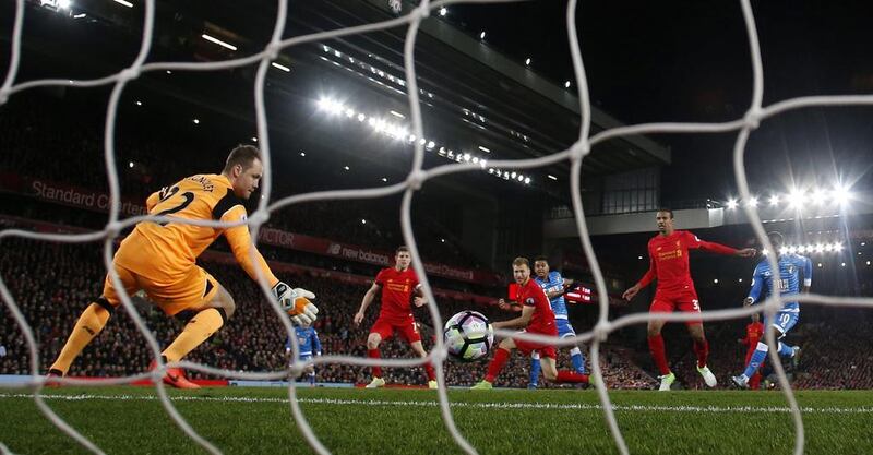 Bournemouth's Joshua King scores their second goal against Liverpool on Wednesday. The teams played to a 2-2 draw. Jason Cairnduff / Reuters