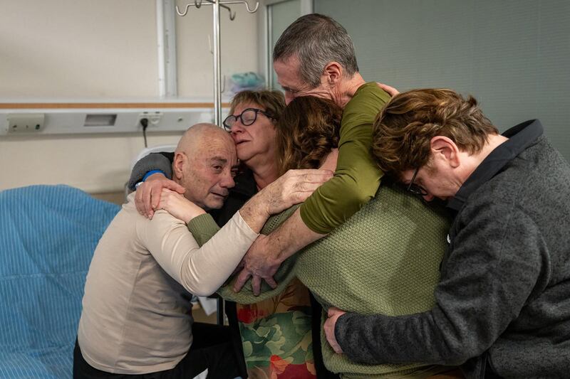 Israeli-Argentinian hostage Louis Har (L) being reunited with his family at the Tel Hashomer Hospital in Ramat Gan, on the outskirts of Tel Aviv. AFP