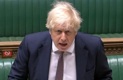 A video grab from footage broadcast by the UK Parliament's Parliamentary Recording Unit (PRU) shows Britain's Prime Minister Boris Johnson attending the weekly Prime Minister's Questions (PMQs) during a hybrid, socially distanced session at the House of Commons in London on January 13, 2021. Britain's interior minister on Tuesday warned that anyone flouting coronavirus lockdown rules would face action from the police, as the government vowed to step up enforcement measures to cut surging infection rates that risk overwhelming health services. - RESTRICTED TO EDITORIAL USE - MANDATORY CREDIT " AFP PHOTO / PRU " - NO USE FOR ENTERTAINMENT, SATIRICAL, MARKETING OR ADVERTISING CAMPAIGNS
 / AFP / PRU / JESSICA TAYLOR / RESTRICTED TO EDITORIAL USE - MANDATORY CREDIT " AFP PHOTO / PRU " - NO USE FOR ENTERTAINMENT, SATIRICAL, MARKETING OR ADVERTISING CAMPAIGNS
