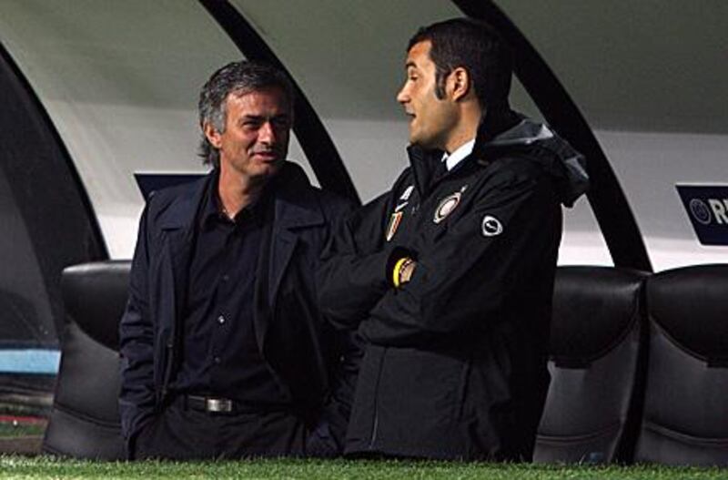 Jose Mourinho, left, in a happy mood before Inter Milan's defeat to Barcelona on Tuesday.