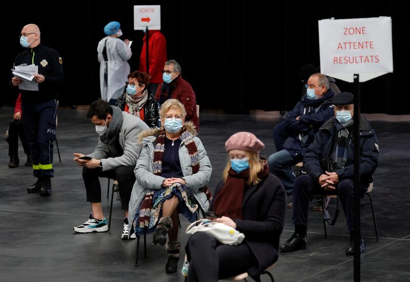People wait for their test results at a coronavirus disease testing center in the Kursaal concert hall in Dunkirk. Reuters