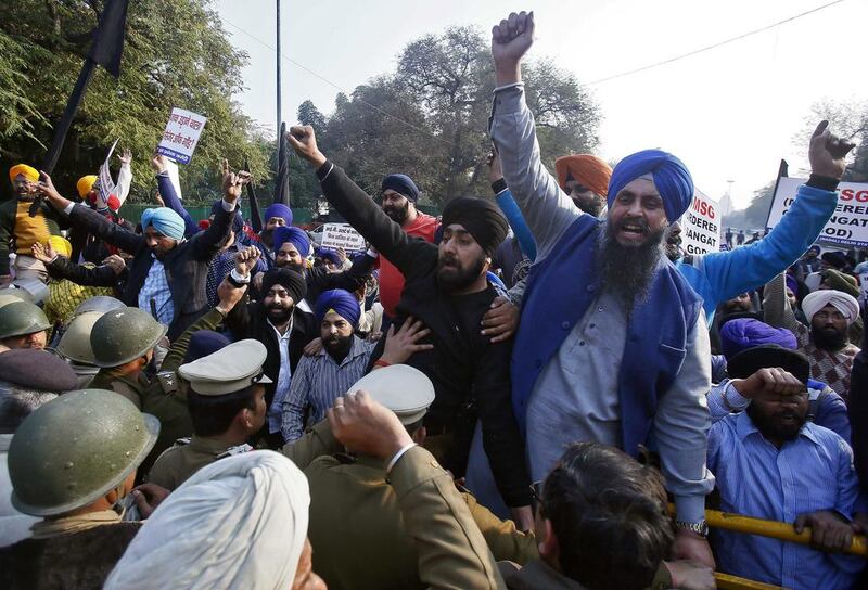Members of New Delhi’s Sikh community clash with police while protesting the release of MSG: The Messenger of God. Reuters

