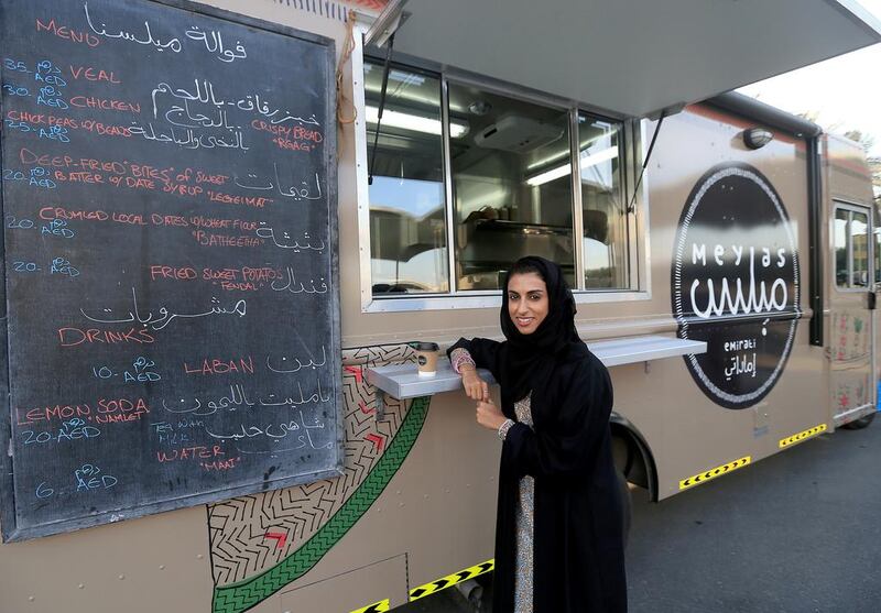 Shaikha Al Kaabi with her Meylas food truck, which serves Emirati cuisine in locations around Abu Dhabi. Ravindranath K / The National 