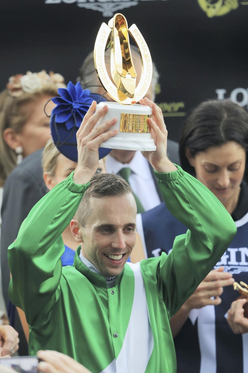 SYDNEY, AUSTRALIA - MARCH 24:  Brenton Avdulla holds the Golden Slipper trophy after winning on Estijaab during Golden Slipper Day at Rosehill Gardens on March 24, 2018 in Sydney, Australia.  (Photo by Mark Evans/Getty Images)