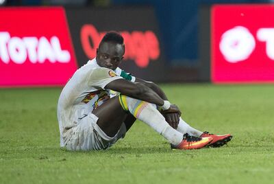 FRANCEVILLE, GABON - JANUARY 28: A dejected SADIO MANE of Senegal after he missed his penalty during the quarter-final match between Senegal and Cameroon at Stade Franceville on January 28, 2017 in Franceville, Gabon. (Photo by Visionhaus/Corbis via Getty Images)