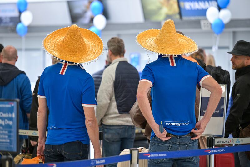 Rangers fans at Glasgow airport. Getty