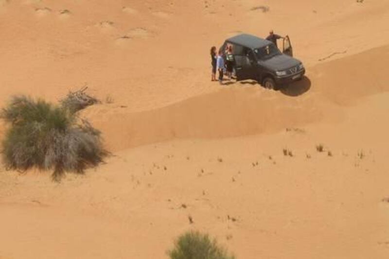 A Britsh family who were rescued by Dubai Police after they got stranded in the desert.

Courtesy Dubai Police