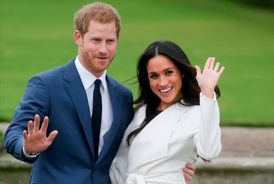 (FILES) In this file photo taken on November 27, 2017 Britain's Prince Harry and his fiancée US actress Meghan Markle pose for a photograph in the Sunken Garden at Kensington Palace in west London following the announcement of their engagement. The Duke and Duchess of Sussex have told the UK's tabloid press they are ending all co-operation with them on April 20, 2020. / AFP / Daniel LEAL-OLIVAS
