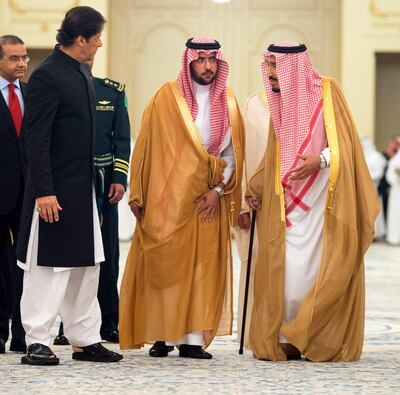 epa07034015 A handout photo made available by Saudi Arabia's Center for International Communication (CIC) shows Saudi King Salman bin Abdulaziz Al Saud (R) receiving Pakistani Prime Minister Imran Khan (L), in Jeddah, Saudi Arabia, 19 September 2018 (issued 20 September 2018). Khan arrived in Saudi Arabia on 18 September on his first official international visit since he took office last month. The Saudi-Pakistani talks touched on key bilateral, regional and international matters.  EPA/CENTER FOR INTERNATIONAL COMMUNICATION HANDOUT  HANDOUT EDITORIAL USE ONLY/NO SALES