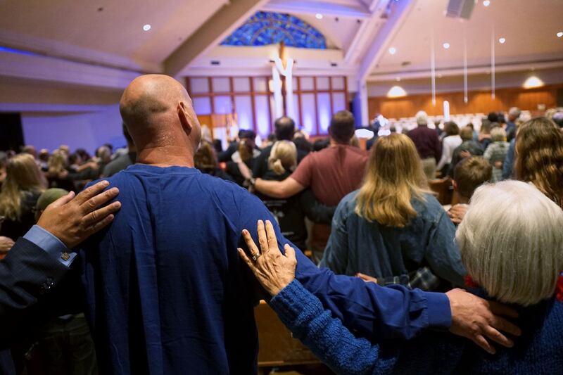Mourners participate in a vigil for the victims of the Chabad of Poway Synagogue shooting at the Rancho Bernardo Community Presbyterian Church on April 27, 2019. AFP