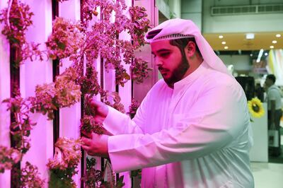 DUBAI, UNITED ARAB EMIRATES , Feb 19  – 2020 :- Abdula Aziz Al Mulla, Co Founder and CEO , Madar Farms at his stand at the Gulfood held at Dubai World Trade Centre in Dubai. (Pawan  Singh / The National) For  POAN. Story by Sophia Vahanvaty   