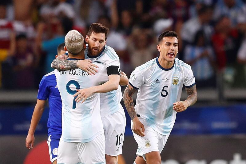 Argentina's Lionel Messi, centre, celebrates with teammates after scoring from the penalty spot in Argentina's 1-1 draw against Paraguay in Group B of the 2019 Copa America. EPA