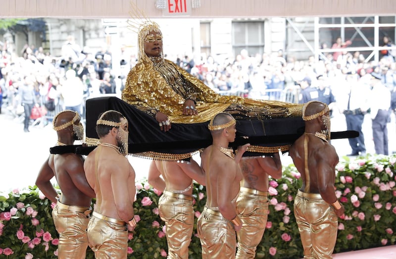 Billy Porter arrives at the 2019 Met Gala  'Camp: Notes on Fashion', carried on a golden litter. EPA