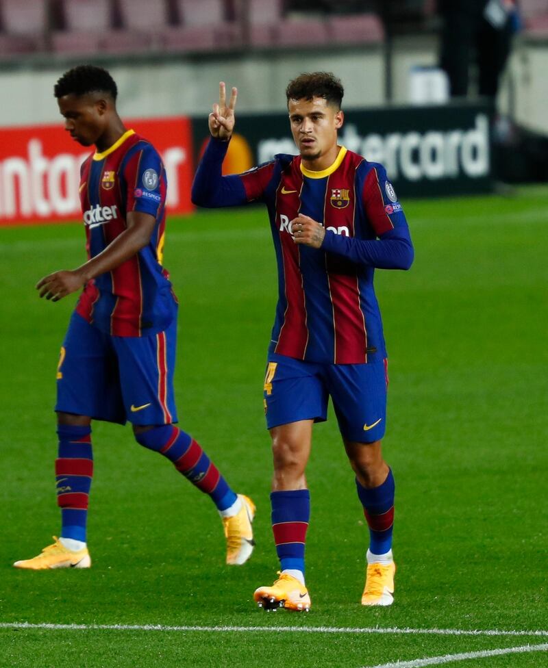 Barcelona's Philippe Coutinho celebrates his side's third goal. AP