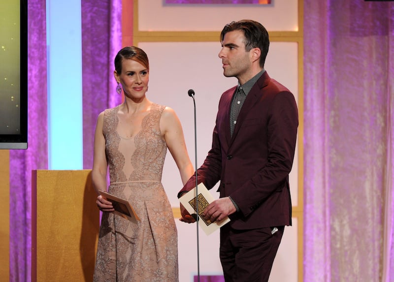 Sarah Paulson, left, and Zachary Quinto speak on stage at the Critics' Choice Television Awards in the Beverly Hilton Hotel on Monday, June 10, 2013, in Beverly Hills, Calif. (Photo by Frank Micelotta/Invision/AP) *** Local Caption ***  2013 Critics Choice Television Awards - Show.JPEG-01b7a.jpg
