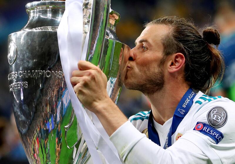 Gareth Bale celebrates winning the Champions League in 2018 by kissing the trophy. Reuters