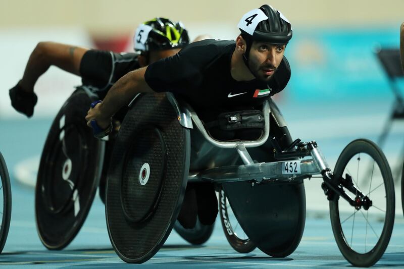 epa07999796 Mohamed Al Haammadi of UAE leads to win in the men's 800m T34 final at the World Para Athletics Championships in Dubai, United Arab Emirates, 15 November 2019.  EPA/MAHMOUD KHALED