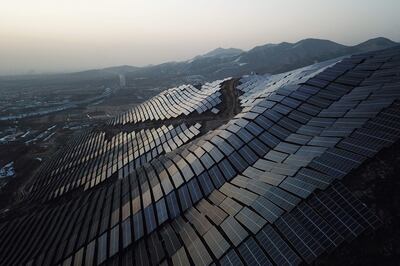Solar panels on hillsides at Xuanhua in Zhangjiakou, one of the host cities for the 2022 Winter Olympic Games, in China's northern Hebei province. AFP