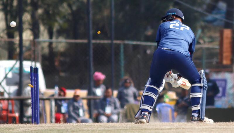 Rusty Theron of USA is out bowled attempting a reverse during the ICC Cricket World Cup League 2 match between USA and Oman at TU Cricket Stadium on 6 February 2020