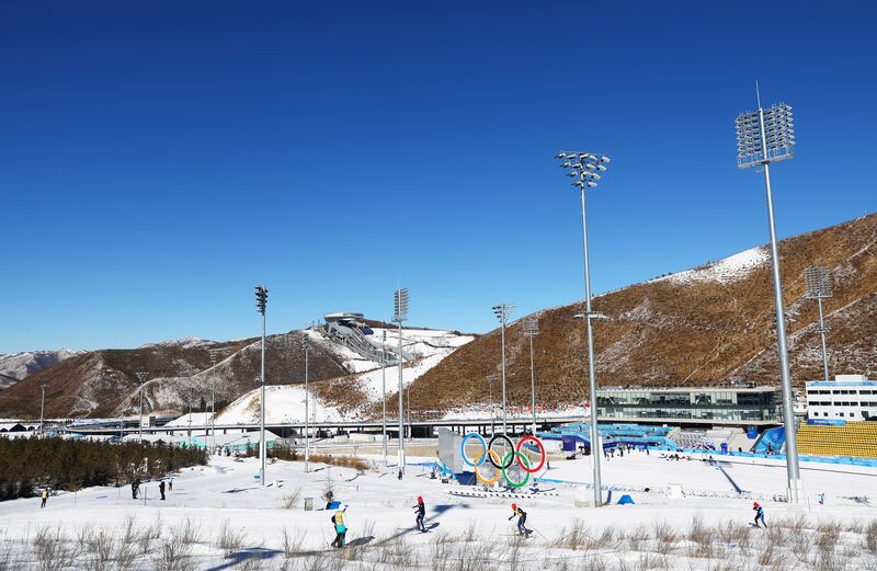 Athletes train during a cross-country skiing training session. Getty 