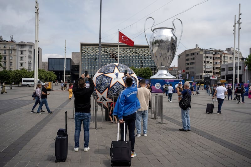A replica of the Champions League trophy greets visitors on the streets of Istanbul. Bloomberg