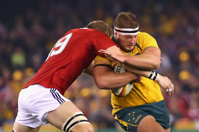 MELBOURNE, AUSTRALIA - JUNE 29:  James Slipper of the Wallabies is tackled by Tom Croft of the Lions  during game two of the International Test Series between the Australian Wallabies and the British & Irish Lions at Etihad Stadium on June 29, 2013 in Melbourne, Australia.  (Photo by Quinn Rooney/Getty Images) *** Local Caption ***  171854909.jpg