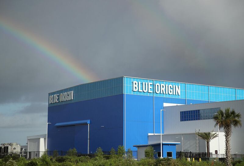 CAPE CANAVERAL, FLORIDA - AUGUST 31: Storm clouds and a rainbow appear over Jeff Bezos Blue Origin Aerospace Manufacturer building as Hurricane Dorian approaches Florida, on August 31, 2019 in Cape Canaveral, Florida. Dorian could be a Category 4 storm as it approaches the state and possibly making landfall as early as Monday somewhere along the east coast.   Mark Wilson/Getty Images/AFP (Photo by MARK WILSON / GETTY IMAGES NORTH AMERICA / Getty Images via AFP)