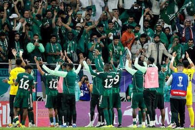 Saudi Arabia's players celebrate with their supporters after their 2-0 win over Kyrgyzstan in the group stage. AFP