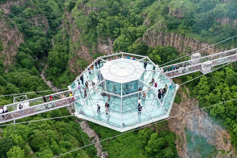 Sitting at the bridge's highest point is a multi-level bar, which is bidding to be crowned the largest and tallest hanging structure in the world by Guinness World Records.