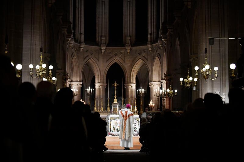epa08089467 Bishop Philippe Marsset leads a midnight mass for Christmas at the Saint Germain l'Auxerrois church in Paris, France, 25 December 2019. French officials confirmed on 21 December 2019 that Notre Dame will not hold a traditional Christmas mass for the first time since 1803, as works continue on the cathedral eight months after a devastating fire that broke out on 15 April 2019.  EPA/JULIEN DE ROSA
