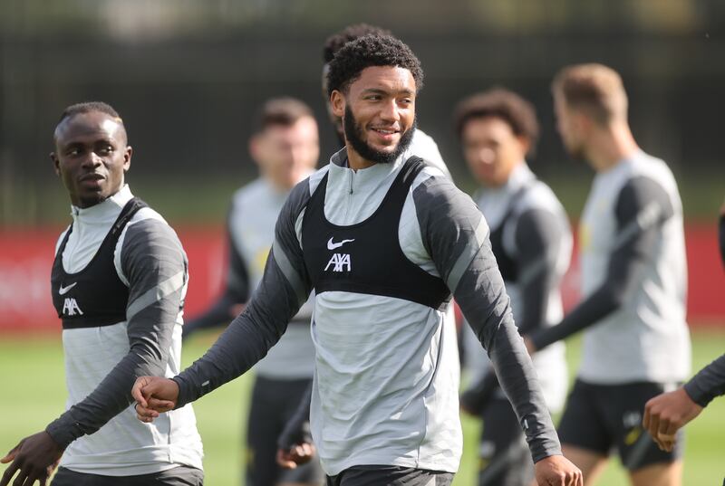 Liverpool's Joe Gomez alongside Sadio Mane, left. Reuters