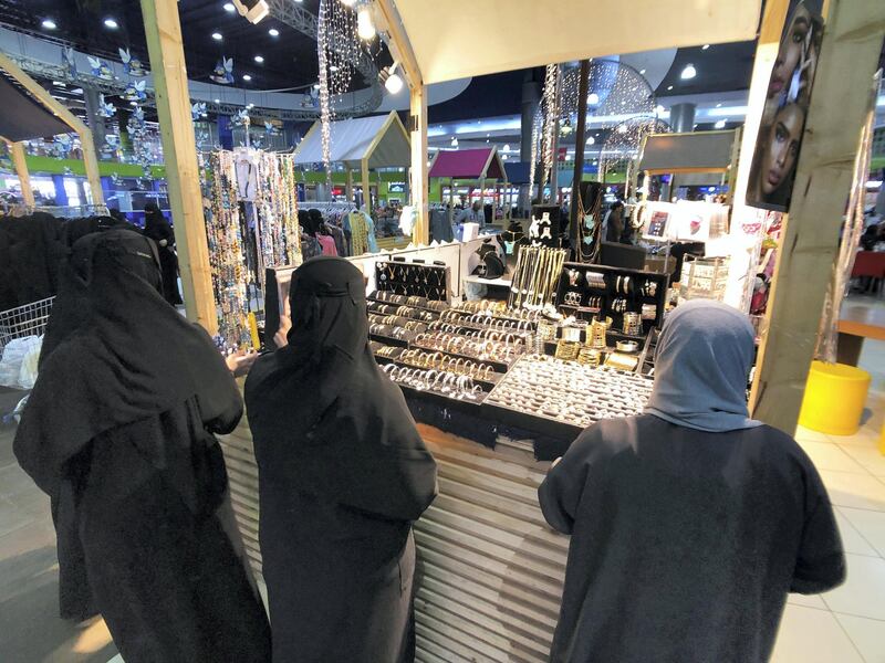 Women shop at a jewellery stand in Dhahran Mall, Saudi Arabia, August 2, 2019. REUTERS/ Hamad I Mohammed