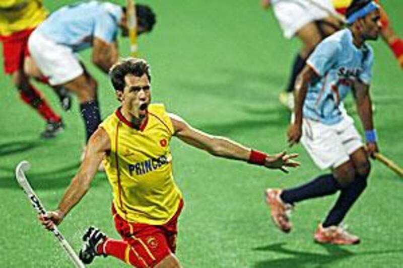 Spain's Albert Sala celebrates after scoring the first goal against India.