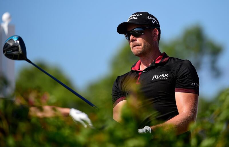Sweden's Henrik Stenson watches after hitting from the fourth tee during the last round of the Hero World Challenge at Albany Golf Club in Nassau, Bahamas, Sunday, Dec. 2, 2018. (AP Photo/Dante Carrer)