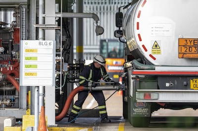A driver fills a fuel tanker at the BP fuel terminal  in Hemel Hempstead. The petrol retailers association said on Sunday morning that up to 22 per cent of filling stations in London and south-east England were dry. Getty Images 