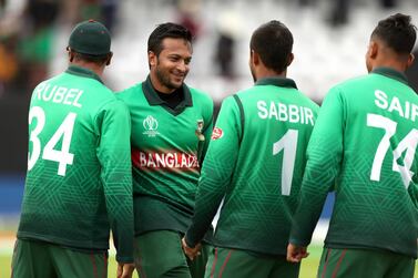 Bangladesh all-rounder Shakib Al Hasan, second left, tops the Cricket World Cup run chart at the moment. David Davies / AP Photo