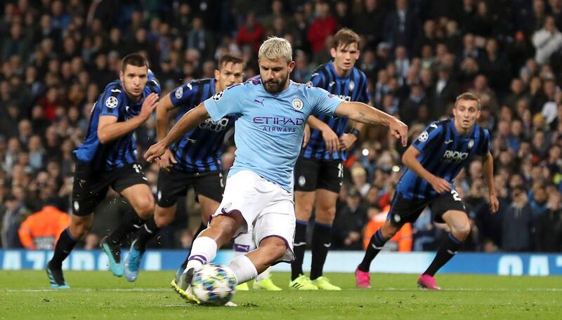 Sergio Aguero scores Manchester City's second goal from the penalty spot. AP Photo