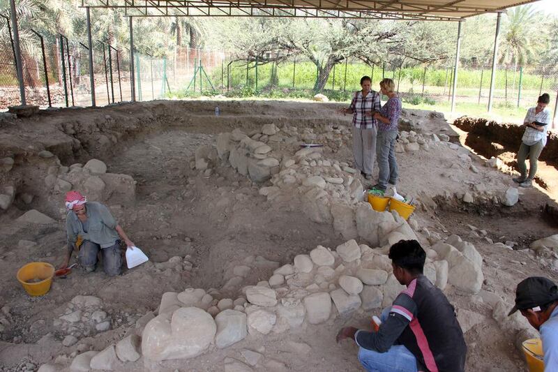 A team examines a site close to the construction of a mosque at Al Qurayyah.  Courtesy Fujairah Tourism and Antiquities Authority