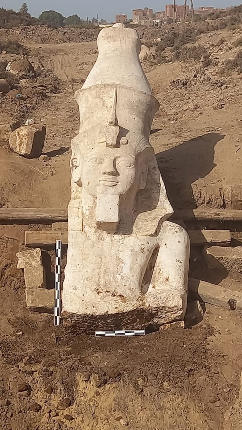 The top section of a limestone statue of Ramses II was unearthed in El Ashmunein, south of the Egyptian city of Minya. Egyptian Ministry of Antiquities via Reuters