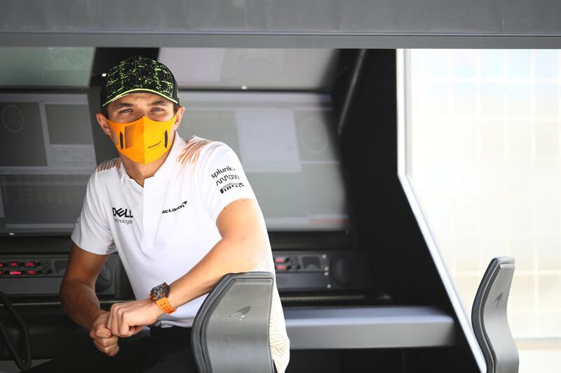 BAHRAIN, BAHRAIN - MARCH 13: Lando Norris of Great Britain and McLaren F1 looks on from the pitwall during Day Two of F1 Testing at Bahrain International Circuit on March 13, 2021 in Bahrain, Bahrain. (Photo by Mark Thompson/Getty Images)